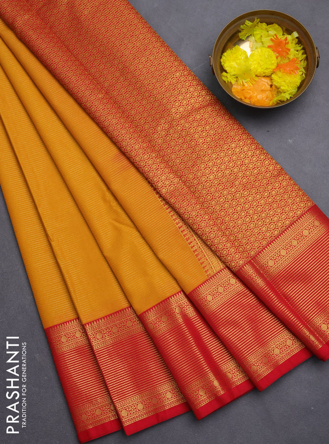 Semi kanchipuram silk saree mustard yellow and red with allover zari weaves and rich zari woven border