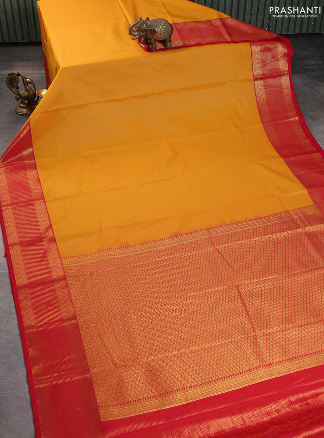 Semi kanchipuram silk saree mustard yellow and red with allover zari weaves and rich zari woven border