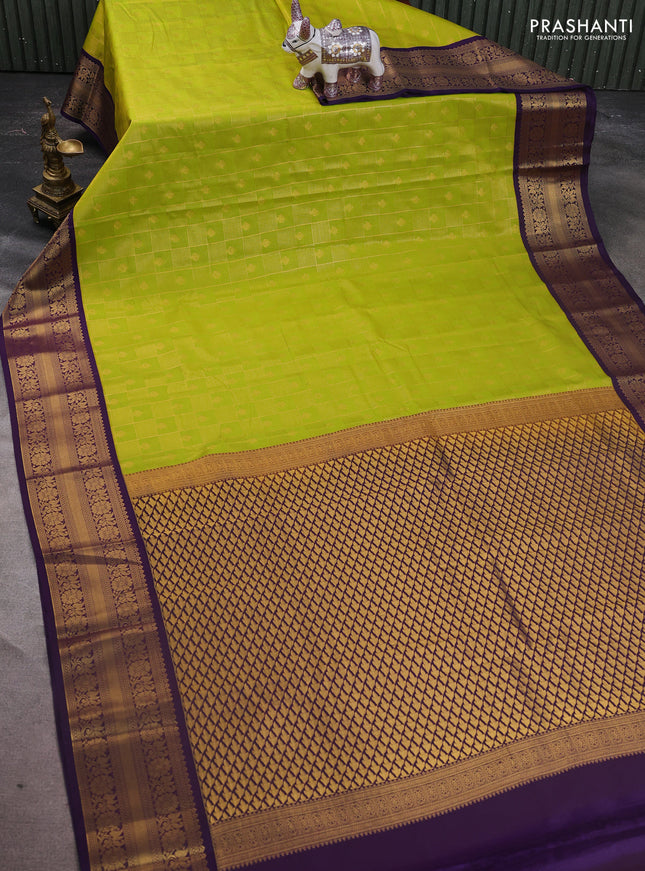 Semi kanchipuram silk saree lime green and purple with allover zari checks & buttas and zari woven korvai border