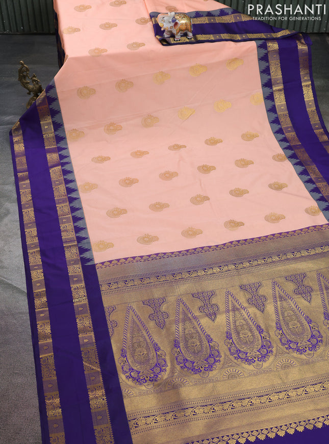 Semi kanchipuram silk saree peach orange and navy blue with zari woven buttas and temple design rettapet zari woven border