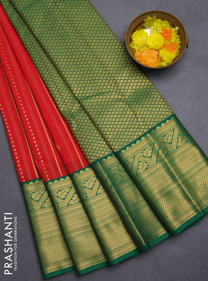 Semi kanchipuram silk saree tomato red and green with allover zari stripes pattern & buttas and long zari woven korvai border