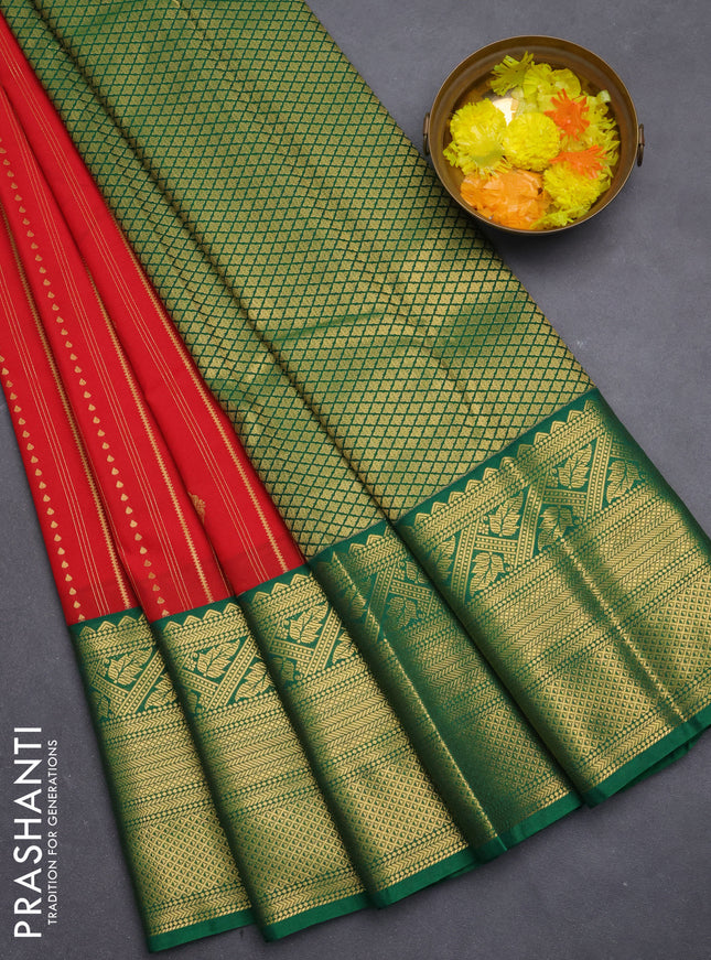 Semi kanchipuram silk saree tomato red and green with allover zari stripes pattern & buttas and long zari woven korvai border