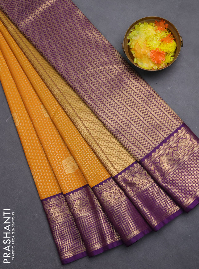 Semi kanchipuram silk saree mustard yellow and purple with allover zari checks & buttas and zari woven border