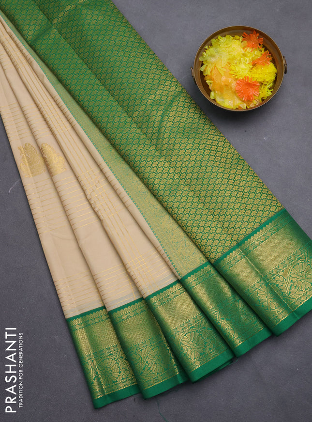 Semi kanchipuram silk saree cream and green with allover zari checks & buttas and zari woven korvai border