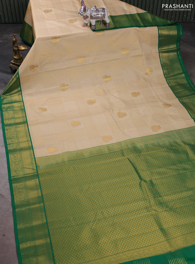 Semi kanchipuram silk saree cream and green with allover zari checks & buttas and zari woven korvai border