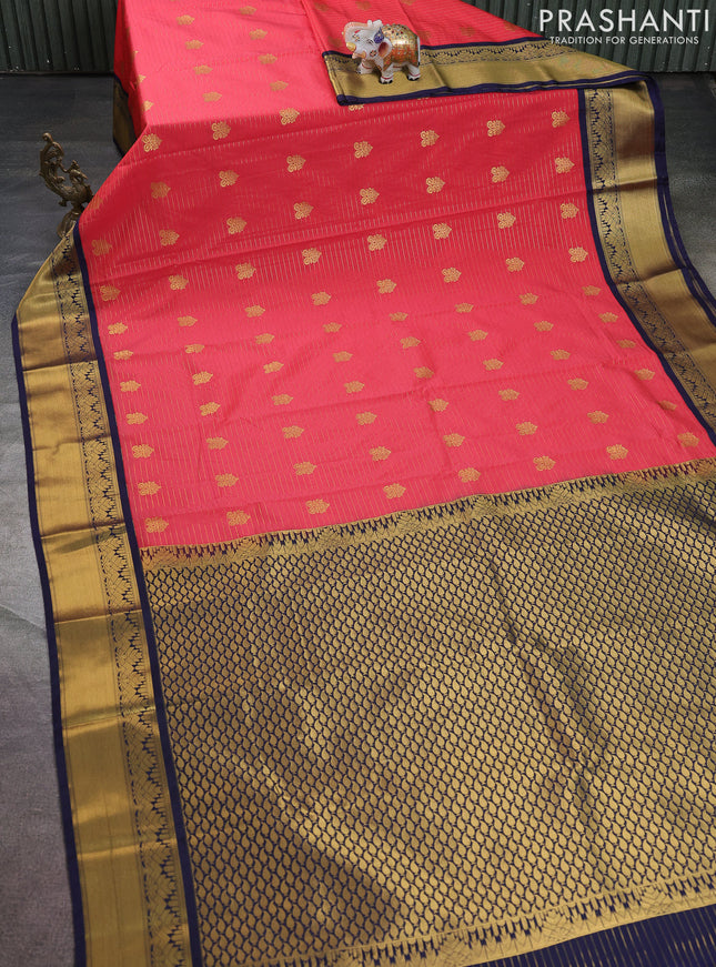 Semi kanchipuram silk saree peach pink and navy blue with allover zari weaves & buttas and rich zari korvai border