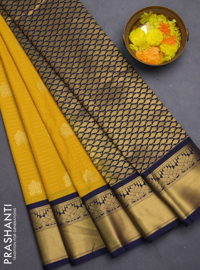Semi kanchipuram silk saree yellow and navy blue with allover zari weaves & buttas and rich zari korvai border