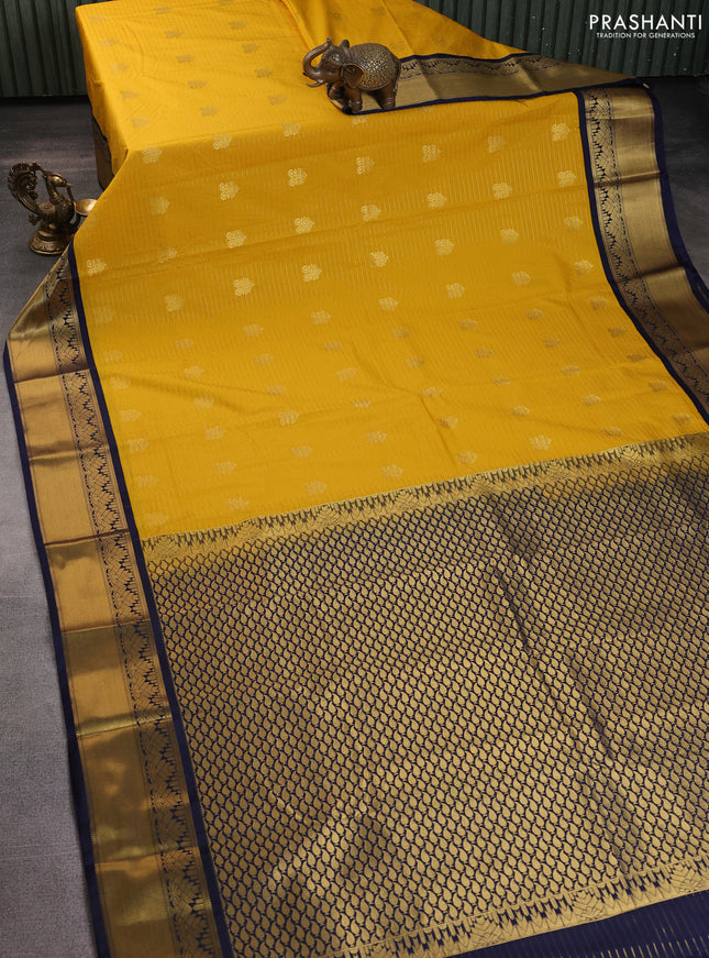 Semi kanchipuram silk saree yellow and navy blue with allover zari weaves & buttas and rich zari korvai border