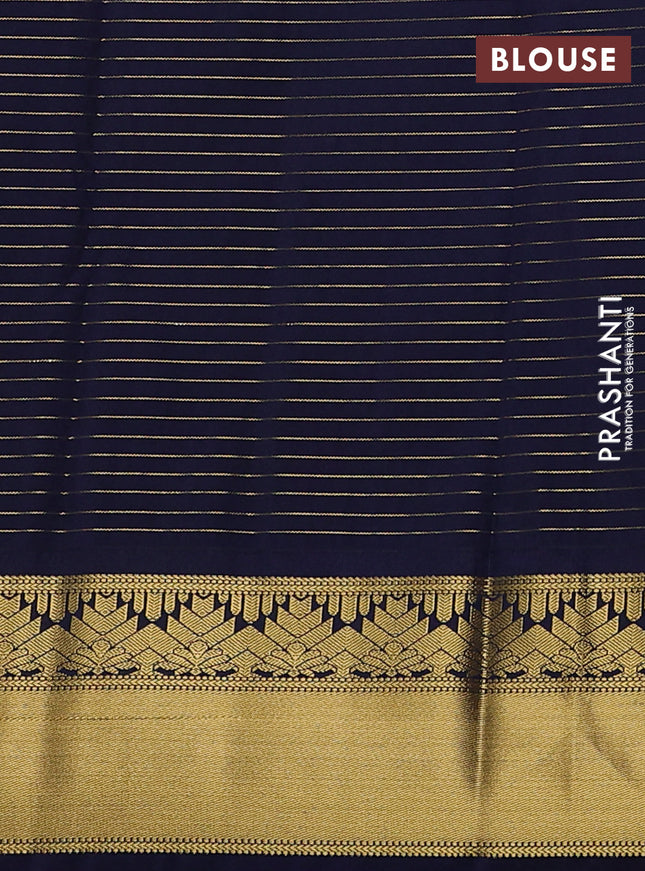 Semi kanchipuram silk saree yellow and navy blue with allover zari weaves & buttas and rich zari korvai border