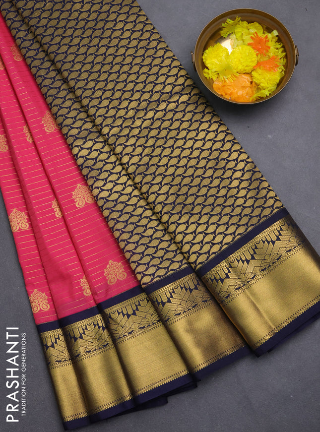 Semi kanchipuram silk saree peach pink and navy blue with allover zari weaves & buttas and rich zari korvai border