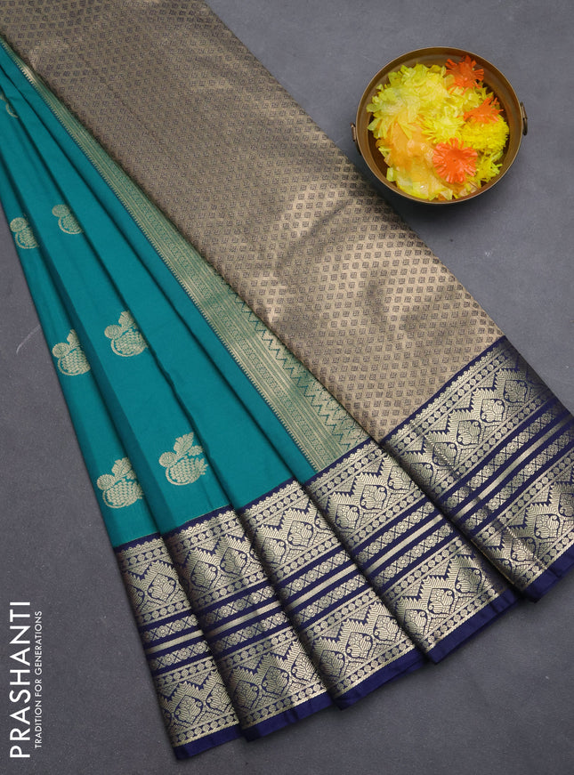 Semi kanchipuram silk saree teal green and navy blue with zari woven buttas and zari woven border