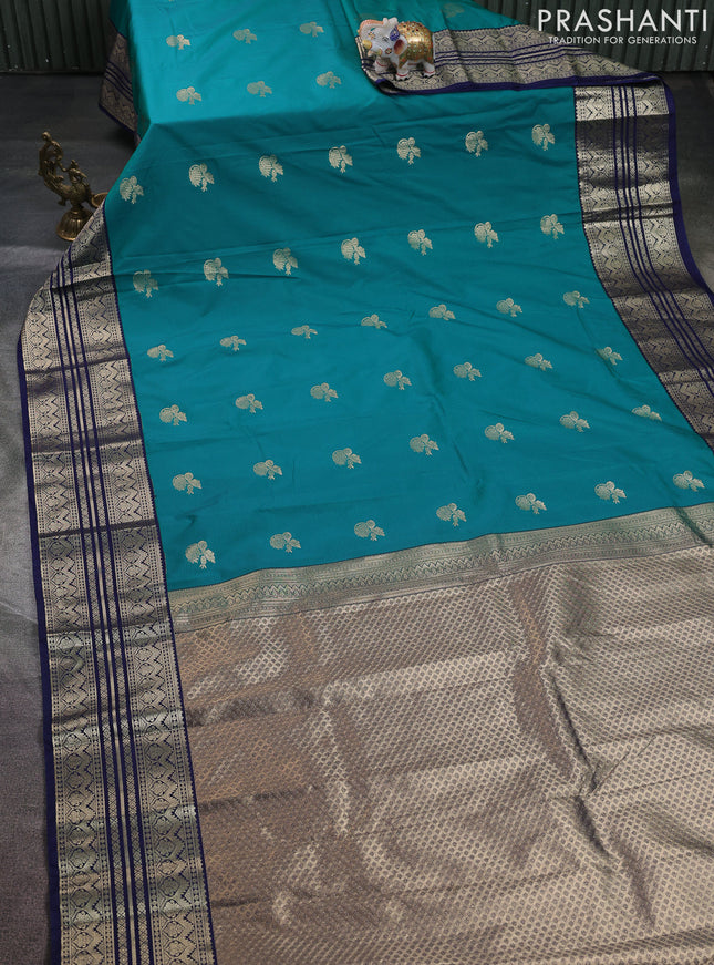 Semi kanchipuram silk saree teal green and navy blue with zari woven buttas and zari woven border
