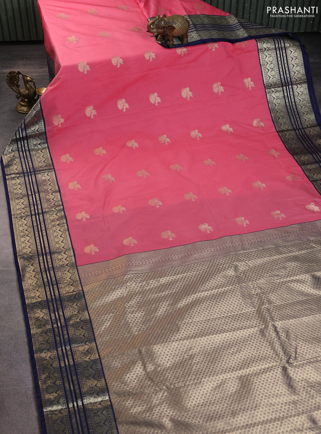 Semi kanchipuram silk saree peach pink and navy blue with zari woven buttas and zari woven border