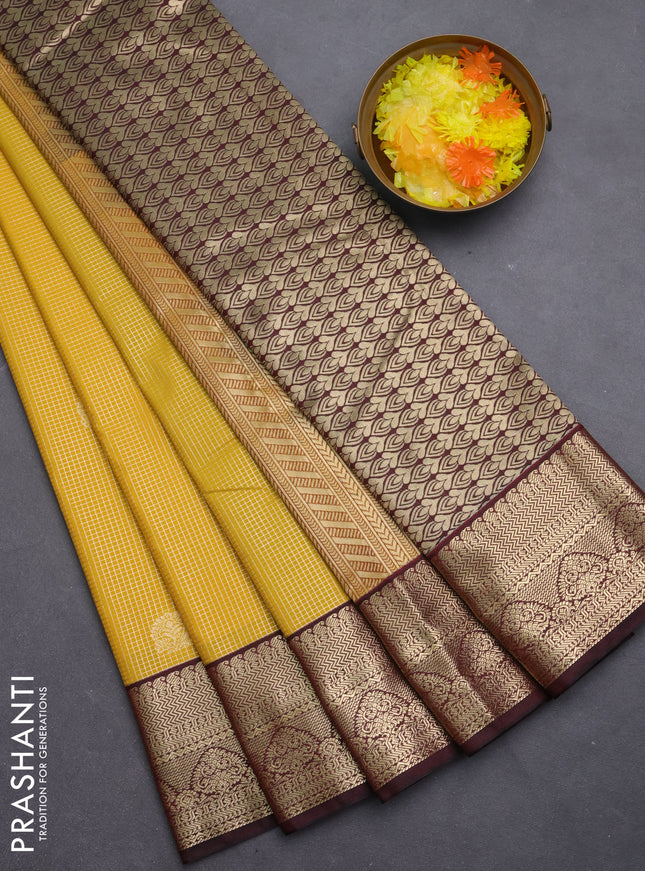 Semi kanchipuram silk saree yellow and deep maroon with allover zari small checks & buttas and zari woven border
