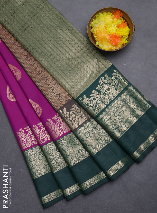 Semi kanchipuram silk saree magenta pink and bottle green with zari woven buttas and long zari woven korvai border