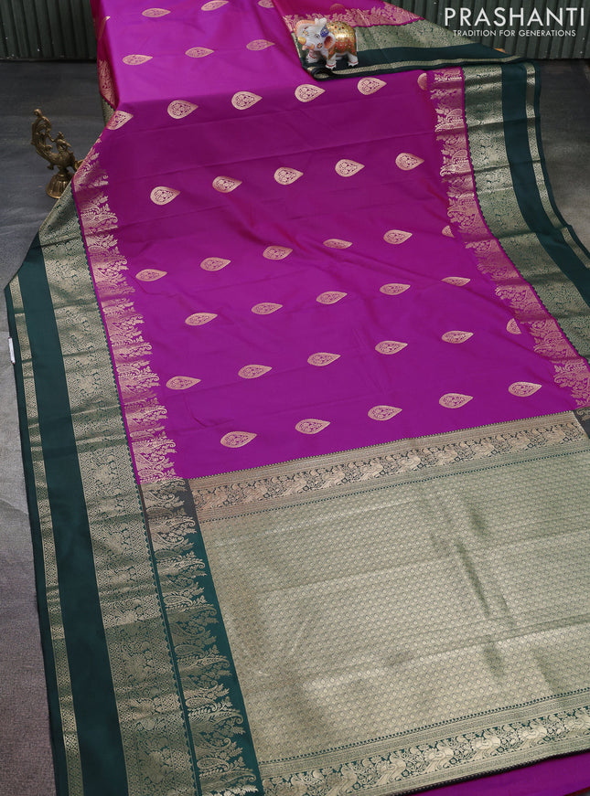 Semi kanchipuram silk saree magenta pink and bottle green with zari woven buttas and long zari woven korvai border