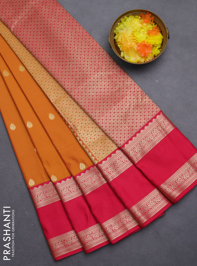 Semi kanchipuram silk saree mustard yellow and pink with zari woven buttas and rettapet zari woven korvai border