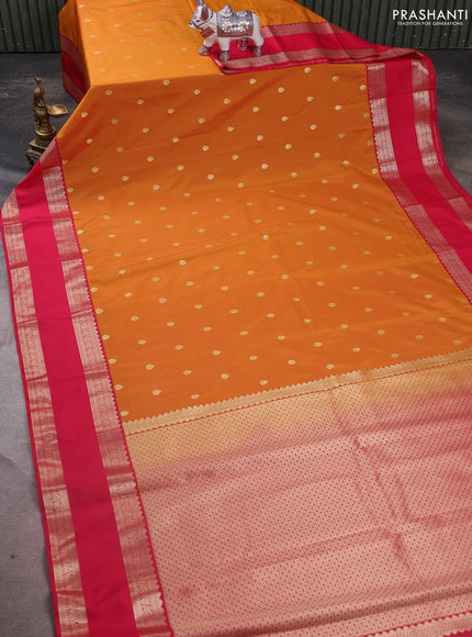 Semi kanchipuram silk saree mustard yellow and pink with zari woven buttas and rettapet zari woven korvai border