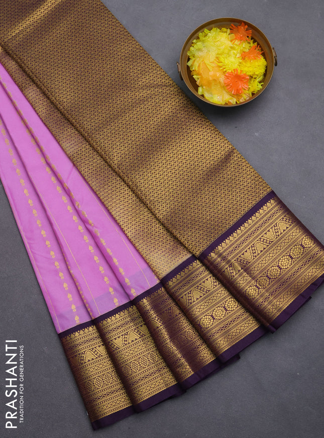 Semi kanchipuram silk saree lavender and purple with allover zari weaves & buttas and zari woven korvai border