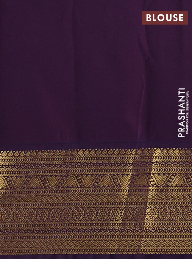 Semi kanchipuram silk saree green and purple with allover zari weaves & buttas and zari woven korvai border