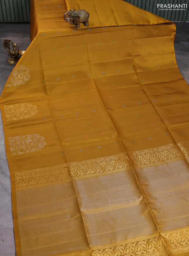 Pure soft silk saree mustard yellow with zari woven buttas and long zari woven butta border