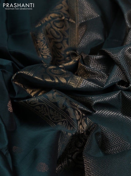 Pure soft silk saree dark peacock green with zari woven buttas and long zari woven butta border