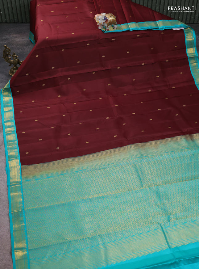 Pure kanchipuram silk saree coffee brown and teal green with zari woven buttas and zari woven korvai border