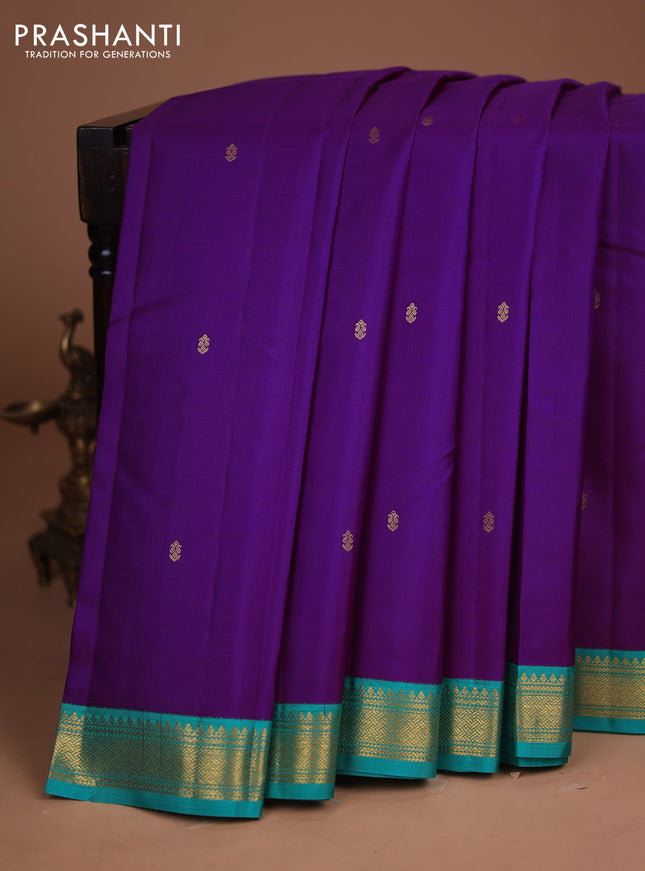 Pure kanchipuram silk saree purple and teal green with zari woven buttas and zari woven korvai border