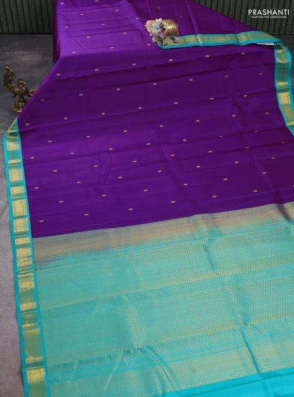 Pure kanchipuram silk saree purple and teal green with zari woven buttas and zari woven korvai border
