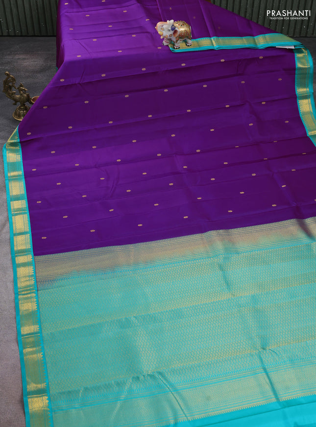 Pure kanchipuram silk saree purple and teal green with zari woven buttas and zari woven korvai border