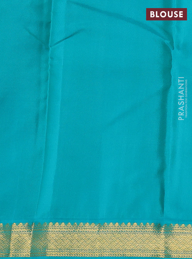 Pure kanchipuram silk saree purple and teal green with zari woven buttas and zari woven korvai border