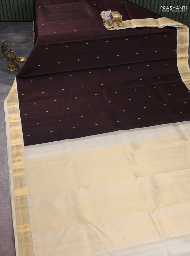 Pure kanchipuram silk saree coffee brown and cream with zari woven buttas and zari woven korvai border