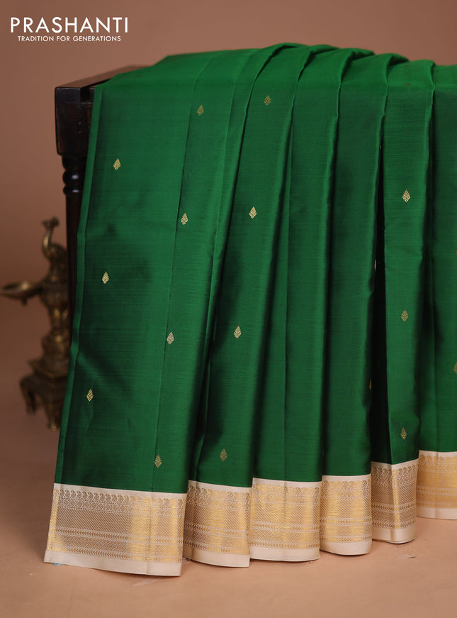 Pure kanchipuram silk saree green and cream with zari woven buttas and zari woven korvai border