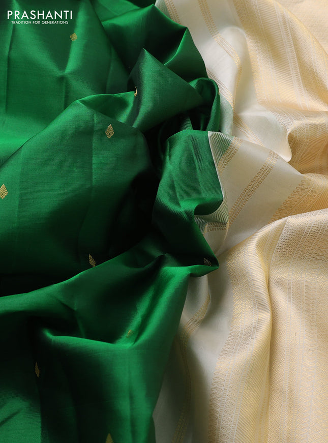 Pure kanchipuram silk saree green and cream with zari woven buttas and zari woven korvai border