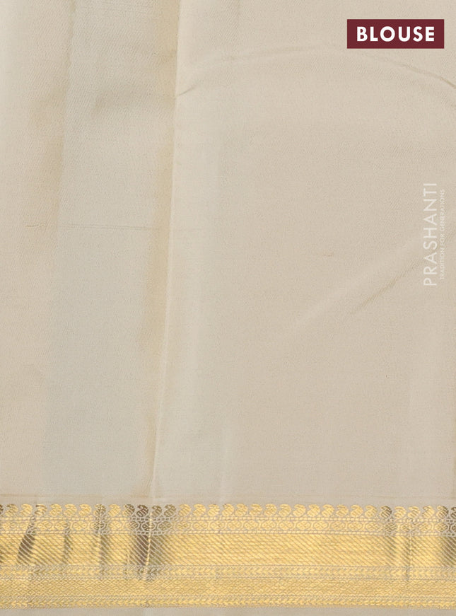 Pure kanchipuram silk saree green and cream with zari woven buttas and zari woven korvai border