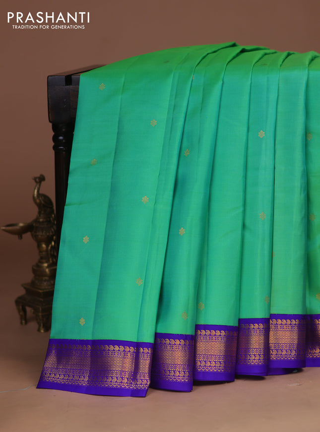 Pure kanchipuram silk saree teal green and royal blue with zari woven buttas and zari woven korvai border