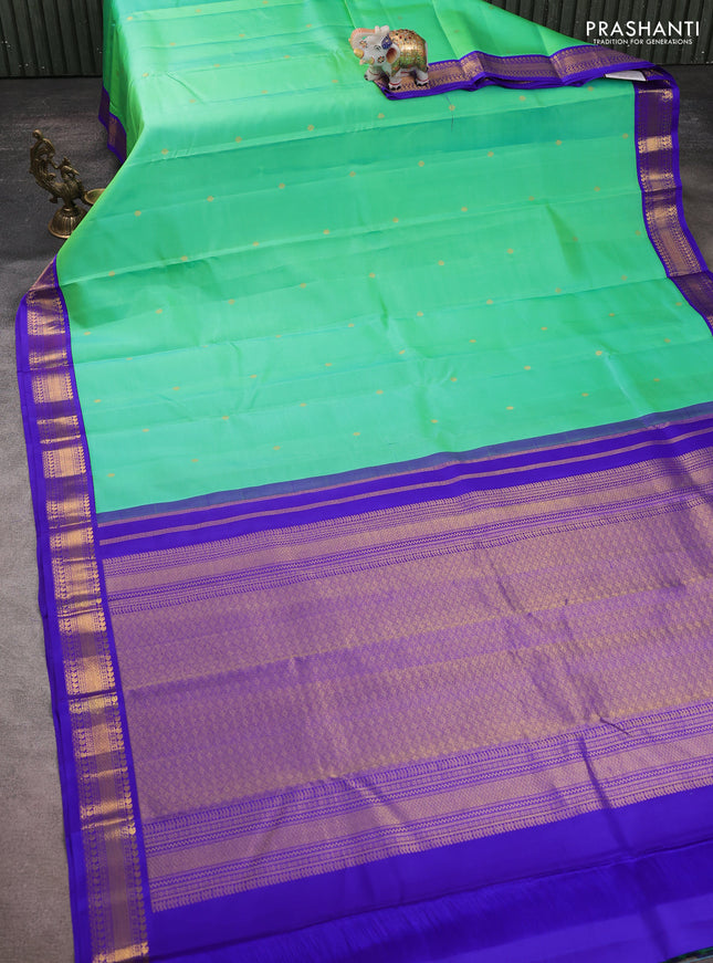 Pure kanchipuram silk saree teal green and royal blue with zari woven buttas and zari woven korvai border