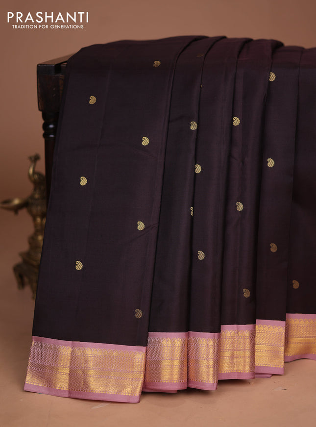 Pure kanchipuram silk saree coffee brown and peach pink with zari paisley buttas and zari woven korvai border