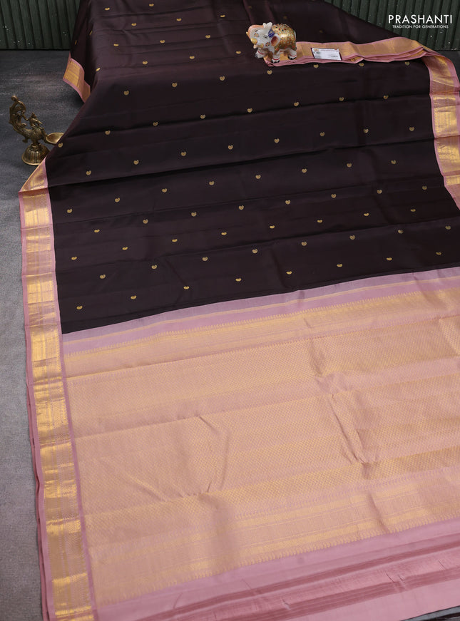 Pure kanchipuram silk saree coffee brown and peach pink with zari paisley buttas and zari woven korvai border