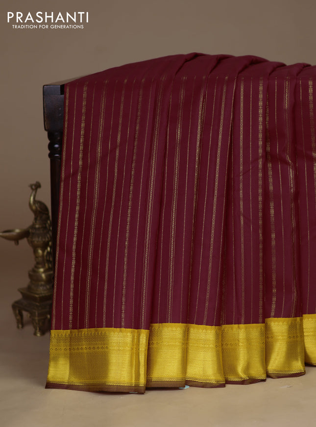 Pure kanchipuram silk saree maroon and yellow with allover zari weaves and zari woven korvai border