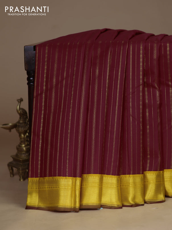Pure kanchipuram silk saree maroon and yellow with allover zari weaves and zari woven korvai border