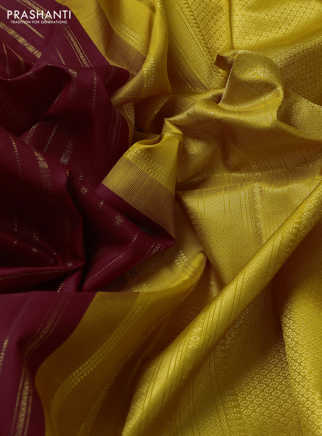 Pure kanchipuram silk saree maroon and yellow with allover zari weaves and zari woven korvai border