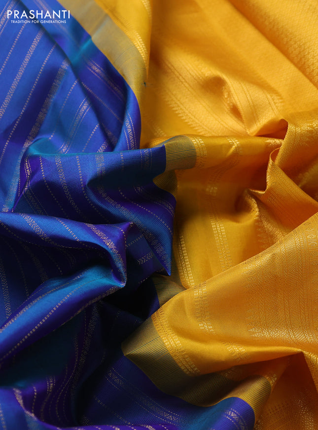 Pure kanchipuram silk saree peacock blue and yellow with allover zari weaves and zari woven korvai border