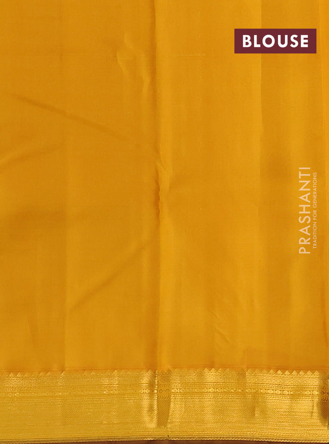 Pure kanchipuram silk saree peacock blue and yellow with allover zari weaves and zari woven korvai border