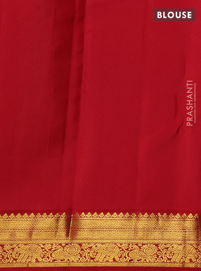 Pure kanchipuram silk saree green and red with allover zari weaves & buttas and zari woven korvai border