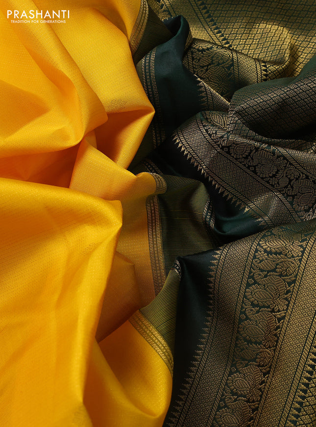 Pure kanchipuram silk saree yellow and bottle green with allover zari weaves & buttas and zari woven korvai border