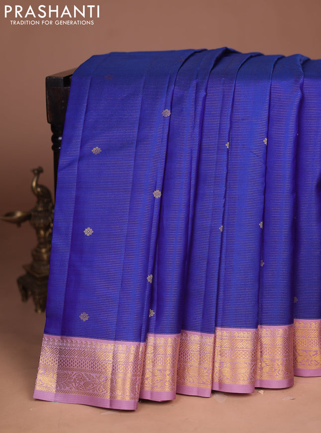 Pure kanchipuram silk saree blue and pastel pink with allover zari weaves & buttas and zari woven korvai border