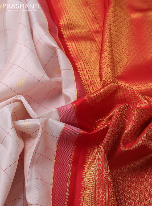 Pure kanchipuram silk saree beige and red with allover checks & buttas and zari woven korvai border