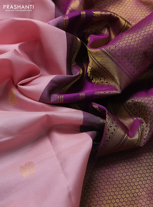 Pure kanchipuram silk saree mild peach pink and purple with zari woven buttas and zari woven korvai border