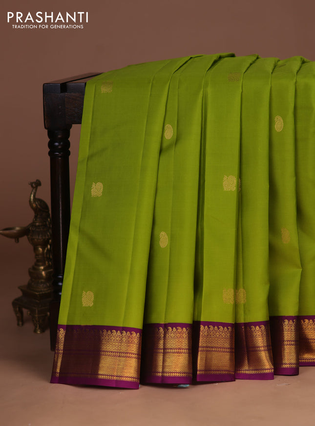 Pure kanchipuram silk saree lime green and purple with zari woven buttas and zari woven korvai border